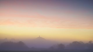 Landscape photograph of Glastonbury Tor in the mist taken using a Leica